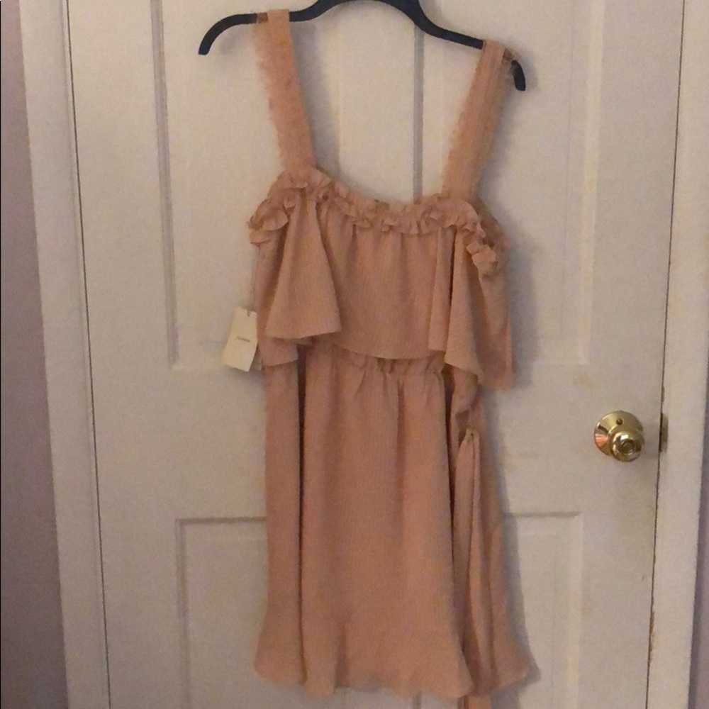 Never worn Tularosa wrap dress.